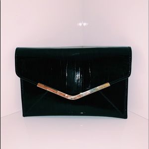 Sondra Roberts Leather Clutch Handbag